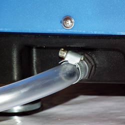 A self-draining crawl space dehumidifier connected to a sump pump system in Jackson Heights