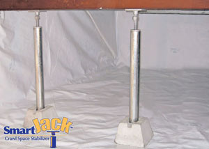 Crawl space structural support jacks installed in Howard Beach