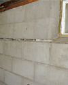 Severely buckling foundation walls in a home in South Richmond Hills in need of repairs.