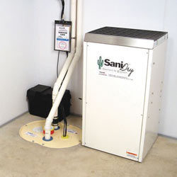 Sump pump system, dehumidifier, and basement wall panels installed during a sump pump installation in Ozone Park