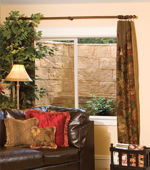 Our durable plastic window well installed in a finished basement in Flushing.