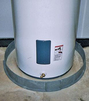 An old water heater in Saint Albans, NY with flood protection installed