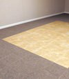 tiled and carpeted basement flooring installed in a Manhattan home
