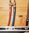 FloodChek washer hoses installed on a washer in Oakland Gardens
