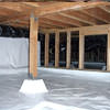 A large, encapsulated crawl space with our vapor barrier system installed in Astoria.