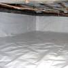 A crawl space vapor barrier has been installed on the walls and floors of this space in Elmhurst.