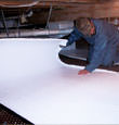 Astoria insulation being installed in a crawl space.