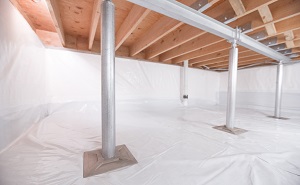 Crawl space structural support jacks installed in Howard Beach