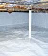 A sealed crawl space in Astoria with a vapor barrier