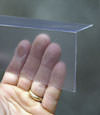 Closeup of a clear plastic covering on a Woodside crawl space block wall