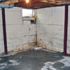 Rusted, corroded i-beams found with a failing foundation in a Rego Park home.