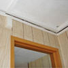 The ceiling and wall separating as the wall sinks with the slab floor in a Fresh Meadows home