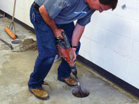 Coring the concrete of a concrete slab floor in Forest Hills