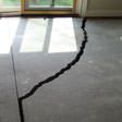 a huge crack in a concrete slab floor in Bronx