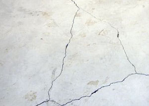 cracks in a slab floor consistent with slab heave in Fresh Meadows.
