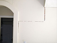 Drywall cracking due to foundation settlement in South Richmond Hills