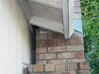 A chimney leaning away from the home on a Woodhaven foundation