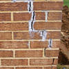 Tuckpointing that cracked due to foundation settlement of a New York City home