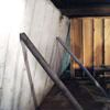 Temporary foundation wall supports stabilizing a Staten Island home