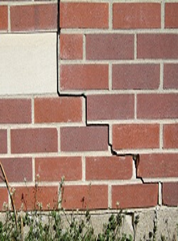 photo of a rotating foundation wall with cracks in Middle Village