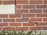 stair step cracking on a foundation wall in New York City