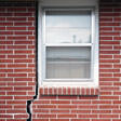 foundation cracks along a window in Flushing