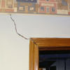 A large settlement crack on interior drywall in a Bayside home.