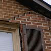 Stair step cracking starting at a window in a Saint Albans home