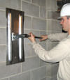 Tightening a wall anchor plate in Staten Island, New York