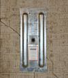 A fully exposed wall anchor plate installed along a Rockaway Park foundation wall