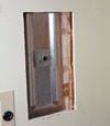 Wall anchor plates installed during a foundation repair in New York City in a finished basement