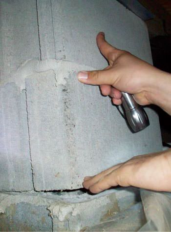 a completely failing concrete crawl space support pillar in Sunnyside
