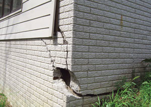 A severely damaged foundation wall in Elmhurst