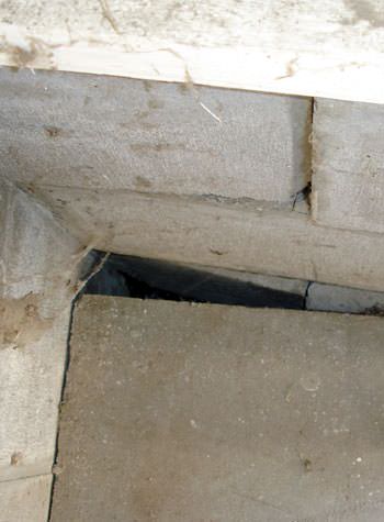 inward rotation of a foundation wall damaged by street creep in a garage in Oakland Gardens