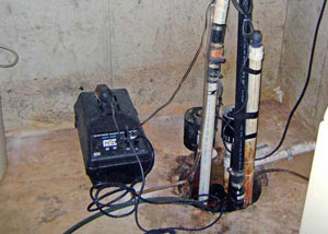 Pedestal sump pump system installed in a home in Bayside