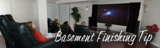 a waterproofed basement that has been finished into a family room in Maspeth