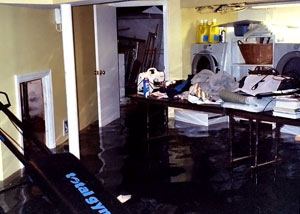 A laundry room flood in Ozone Park, with several feet of water flooded in.