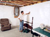 A basement wall covering for creating a vapor barrier on basement walls in Jackson Heights