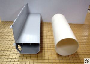 drain pipe and our basement drainage system alongside one another.