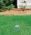 A buried gutter drain downspout extension installed in a Sunnyside home