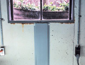 Repaired waterproofed basement window leak in Staten Island