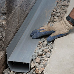 installing a drain tile system in a Woodhaven home